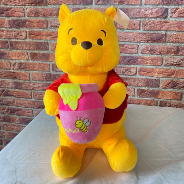 Peluche Winnie l’Ourson avec Pot de Miel – Douce et Câline