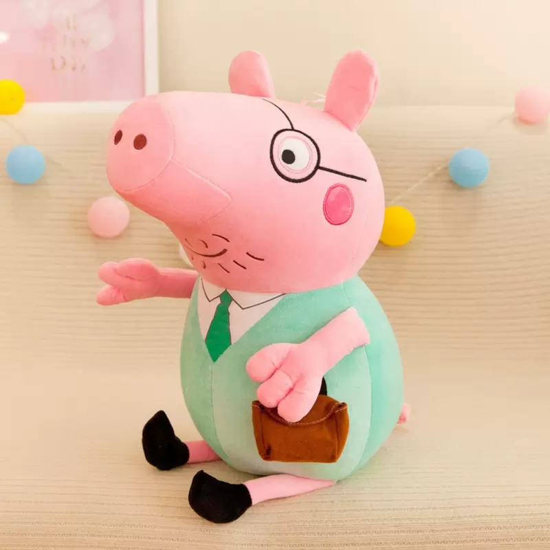 Plush toy of a character from Peppa Pig wearing glasses and a green shirt on a beige background.
