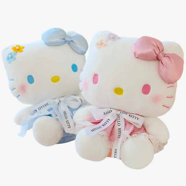 Two Hello Kitty plush toys, one with a blue bow and the other with a pink bow, on a white background.